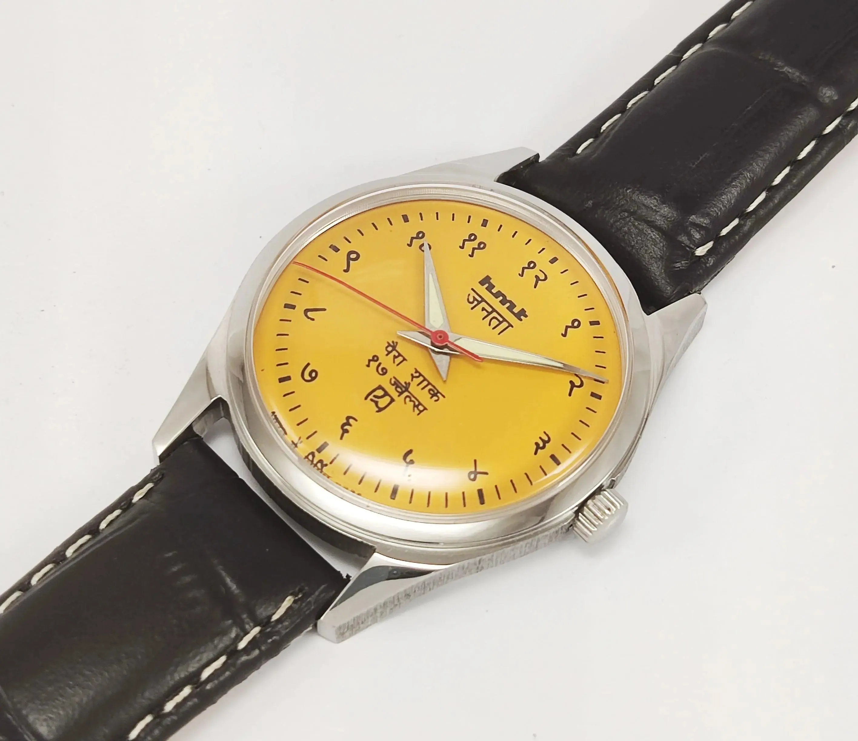 HMT Janata Para Shock 17 Jewels Radium Hands Sun Yellow Devanagari Dial Transparent Back Mechanical Hand winding Men's Wrist Watch